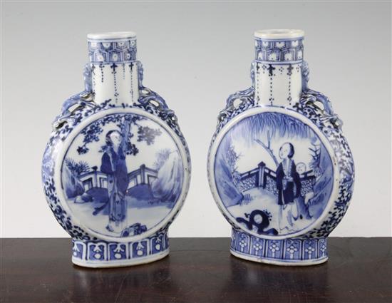 A pair of Chinese blue and white moon flasks, Kangxi four character marks, late 19th century, 20.5cm